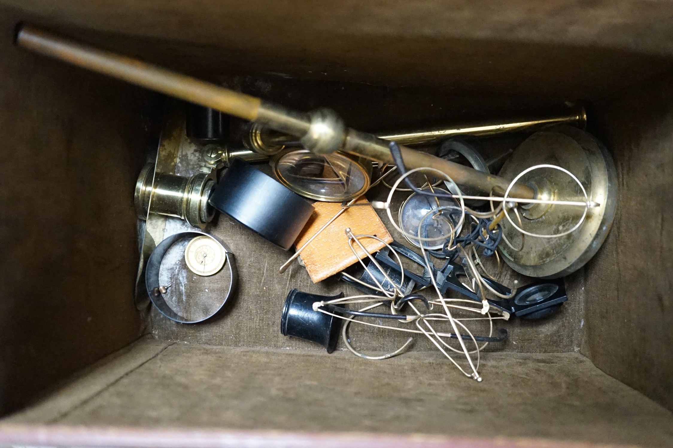 A vintage London Camera Exchange case containing camera plates, lenses etc